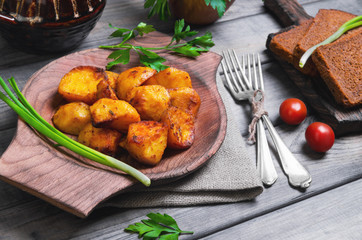 Baked potatoes roasted pieces