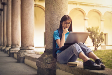 Girl using her laptop