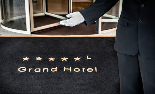 Hotel concierge showing the way