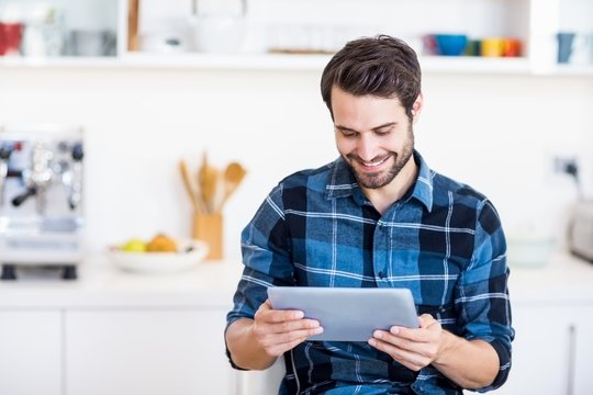 Man Using Digital Tablet