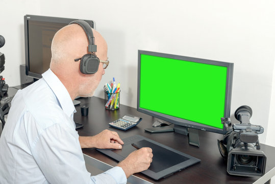 video editor in his studio