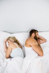 Obraz na płótnie Canvas Couple sleeping on bed