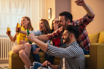 Watching exciting football match