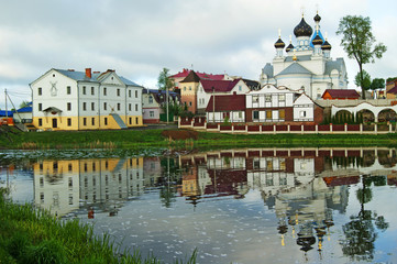 Fancy Orthodox Church and its reflection in the water in Braslav, Vitebsk region, Belarus.