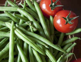 Food preparation on the kitchen table, green beans and ripe cher