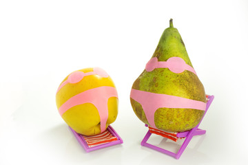 apple and pear in a bathing suit