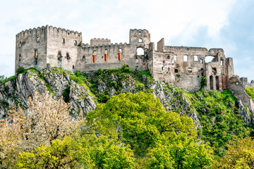 Fototapeta na wymiar Castle wall ruins on the hill in Beckow, Slovakia