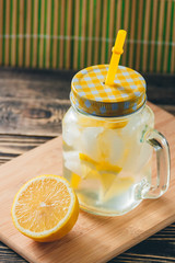 Lemonade with Fresh Lemon. Healthy Food and Drink Concept