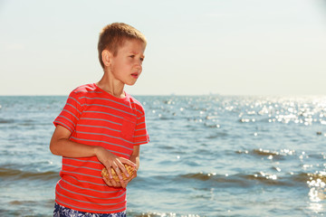 Fototapeta na wymiar Portrait of boy outdoor in summer time.