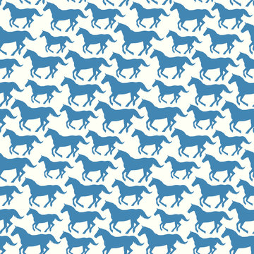 Seamless pattern with stylized silhouette horses