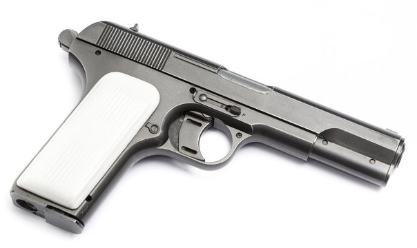 Black pistol on a white background