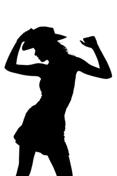 silhouette of a cowgirl dancing and posing