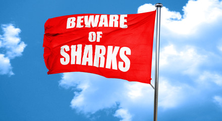 Beware of sharks sign, 3D rendering, a red waving flag