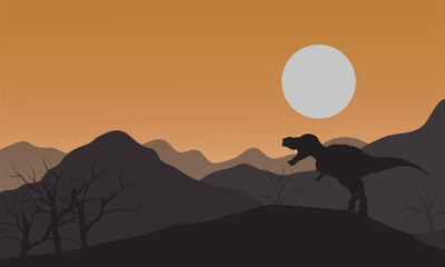 Silhouette of one tyrannosaurus in hills