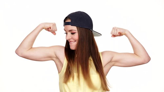 Woman casual style showing off muscles biceps 4K