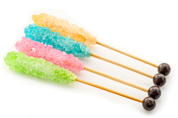 Colorful sugar crystal candy stick.