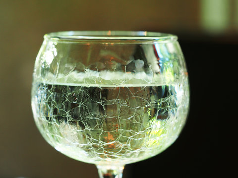 Fragment of glass filled with water drink

