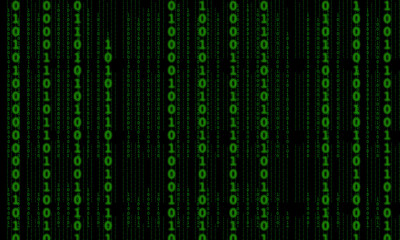 Matrix Binary Computer Background with Black Background and Green Text in Vertical.