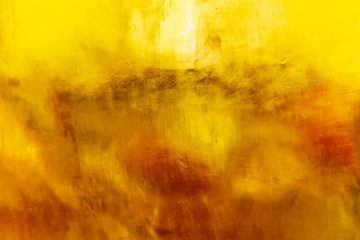 abstract design natural background of bright colors in yellow red warm color, orange, gold,