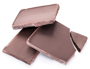 Pieces of chocolate bar isolated on a white background.