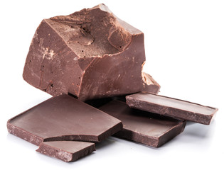 Chocolate blocks and pieces of chocolate bar isolated on a white