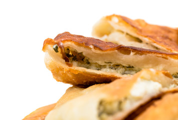 Delicious sliced puff pie with curd cheese.