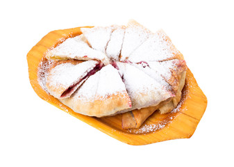 Delicious puff pie with cherry.