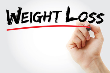 Hand writing Weight Loss with marker, health concept background