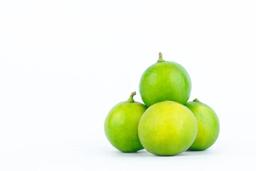 Lime ( lemon ) are high in vitamin C vegetable fruit food on the white background isolated