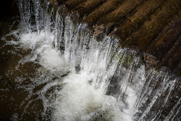 Manmade waterfall on a river