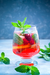 Lemonade with mint and raspberries.