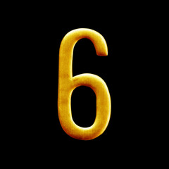 The number six  golden arabic  isolated on black  background.