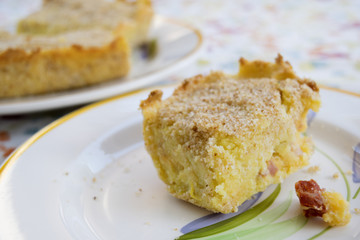 wedge of potatoes pie with cured ham