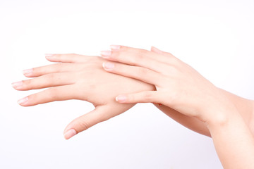 finger hand symbols isolated concept closeup shot of beautiful women hands applying hand cream on the white background