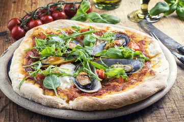 Muschel Pizza mit Rucola