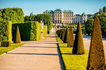 Fotobehang View on Upper Belvedere palace with park alley in Belvedere historic building complex in Vienna. © rh2010