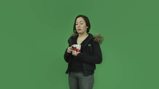 caucasian girl with winter jacket isolated on green screen depressed romance