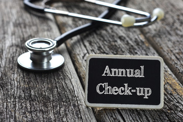Medical Concept-Annual Check-up phrology word written on blackbo