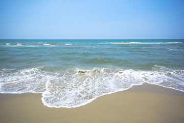 Ocean waves on the beach.
