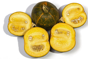  Collection of Halved  and whole gem squashes on white