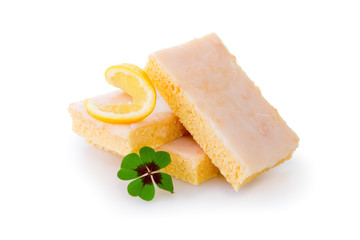 Homemade  lemon cake isolated on white.