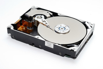 Close up of hard disk drive is a data storage device used for storing and retrieving digital...