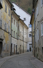 Fototapeta na wymiar narrow street with the strong slope in Ljubljana