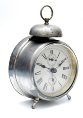 Old alarm clock isolated on white background
