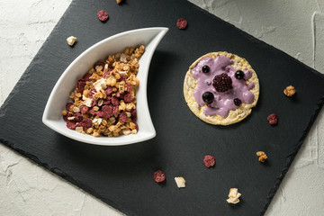 Corn flakes and yogurt in a sail shaped bowl, minimalist style food, Italy