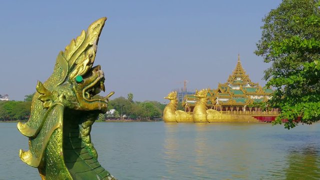 Head of snake and Floating Barge Karaweik in Yangon, Myanmar (Burma), 4k
