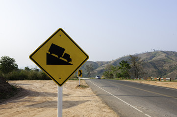 An Steep sign symbol warning dangerous .