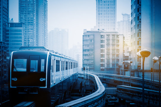 Moving Metro Monorail In Chongqing,china,blue Toned Image.