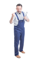 Full body of repairman or mechanic showing both middle fingers