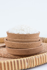 Raw and uncooked rice in basket weave,shallow Depth of Field,Focus on rice. 